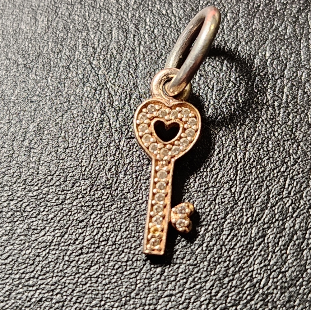 Retired Pandora Rose Gold Symbol of Trust Dangle